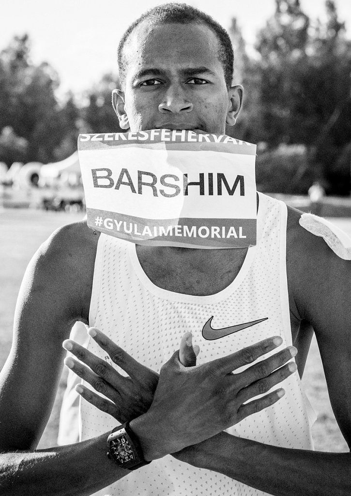 Mutaz Essa Barshim showing the what gravity sign after his succe