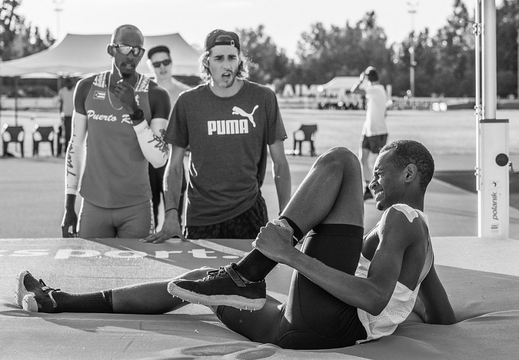 Injured. Barshim's Competitor Tamberi is watching him solicitous